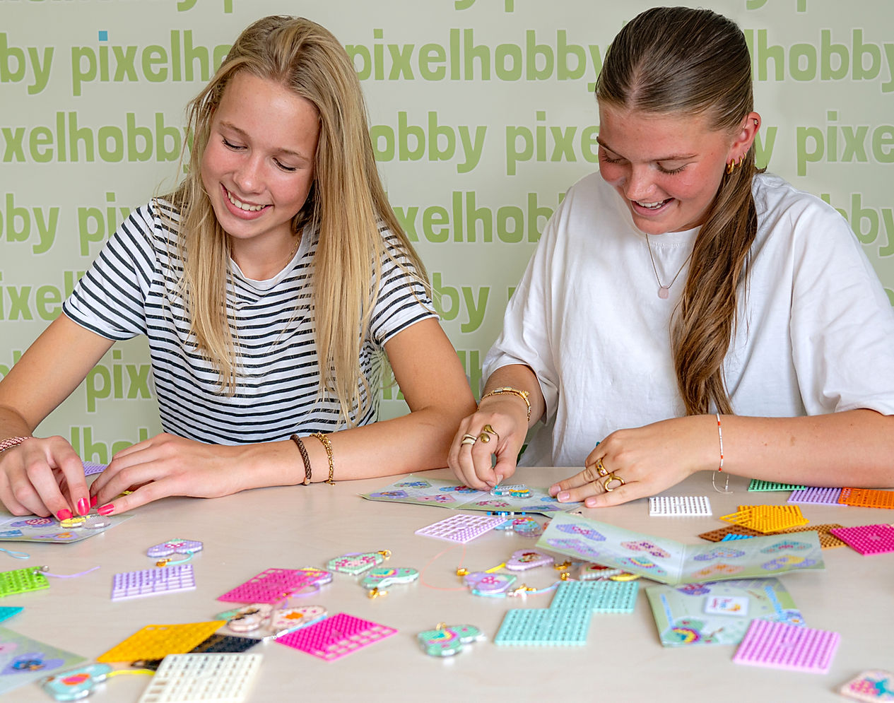 Two makers enjoying a Pixelhobby project together